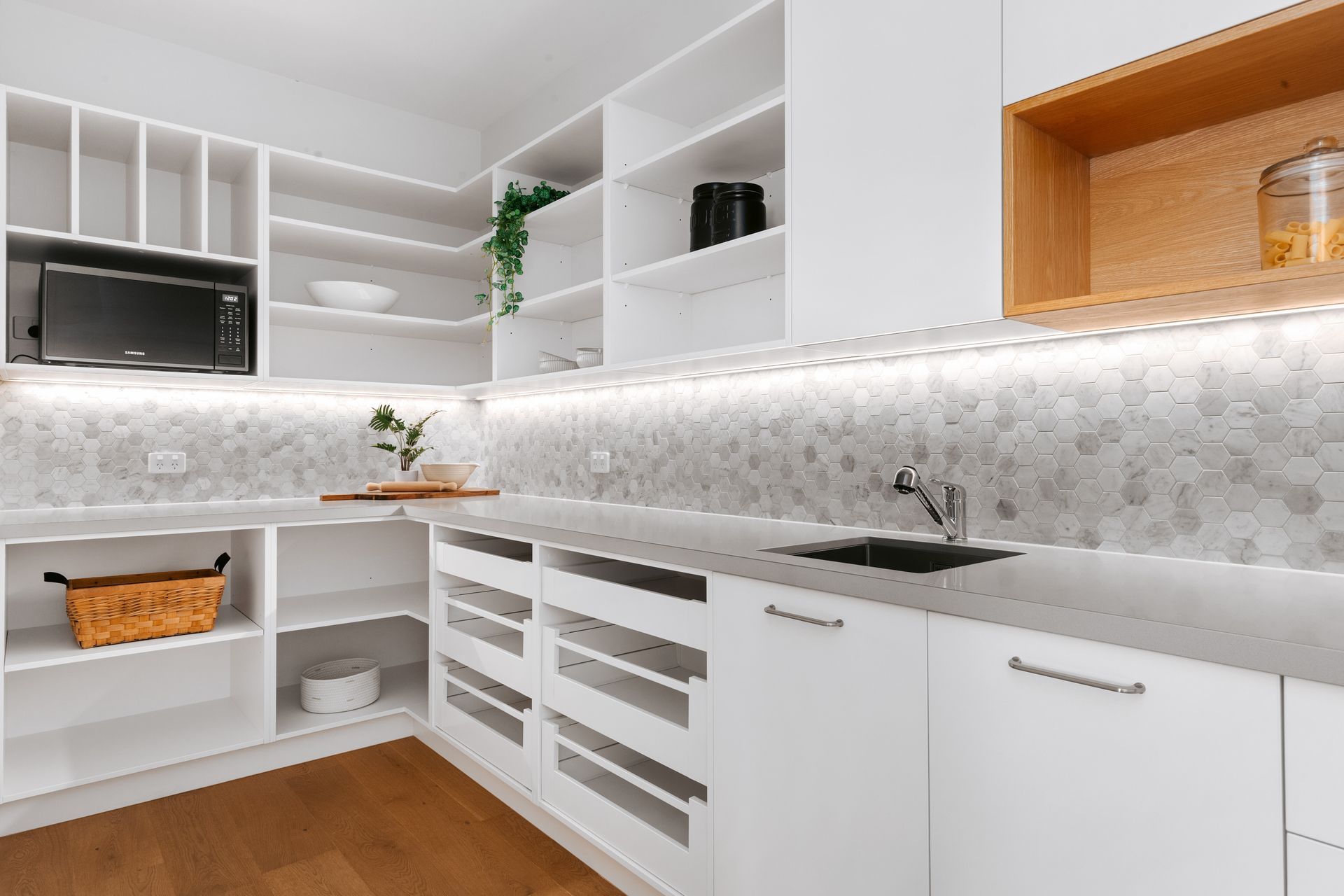 A large scullery is tucked behind the kitchen.