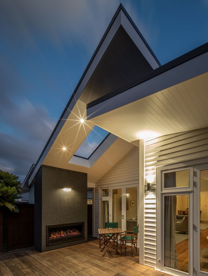 Woburn Villa was transformed by Hark Architects, adding a modern and warm extension at the rear of the house.