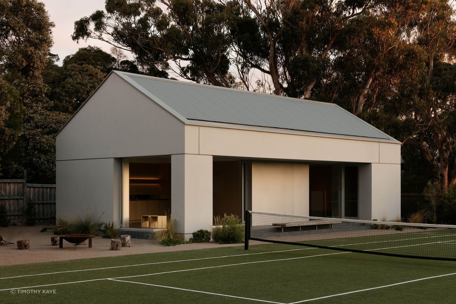 At Sorrento Bathhouse, a pared-back gabled pavilion brings clarity and calm to the garden, framing spaces for recreation, retreat and everyday use.