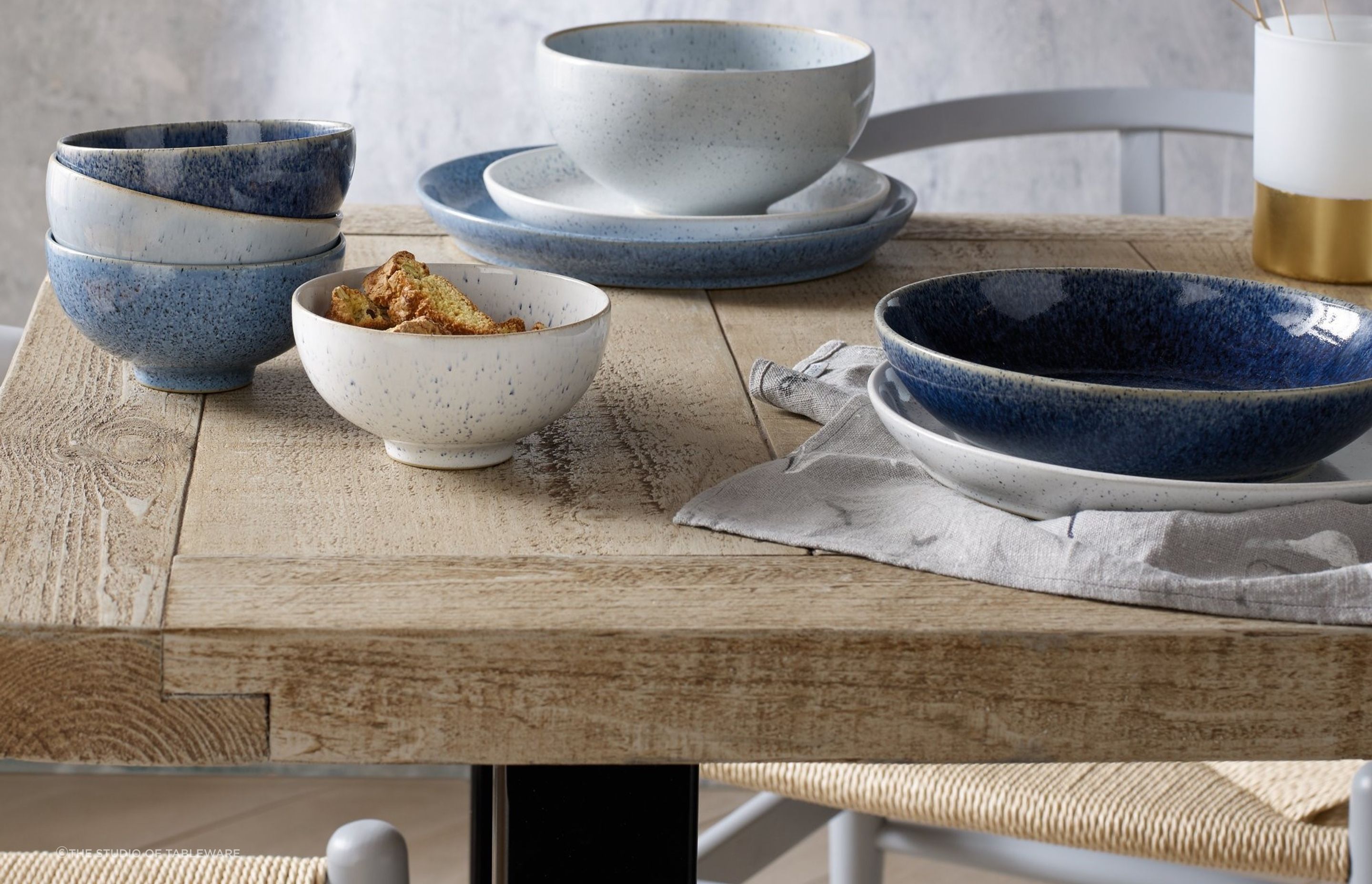 The stunning Studio Blue Dinnerware set shows just how much high-quality table settings can enhance a dining room.