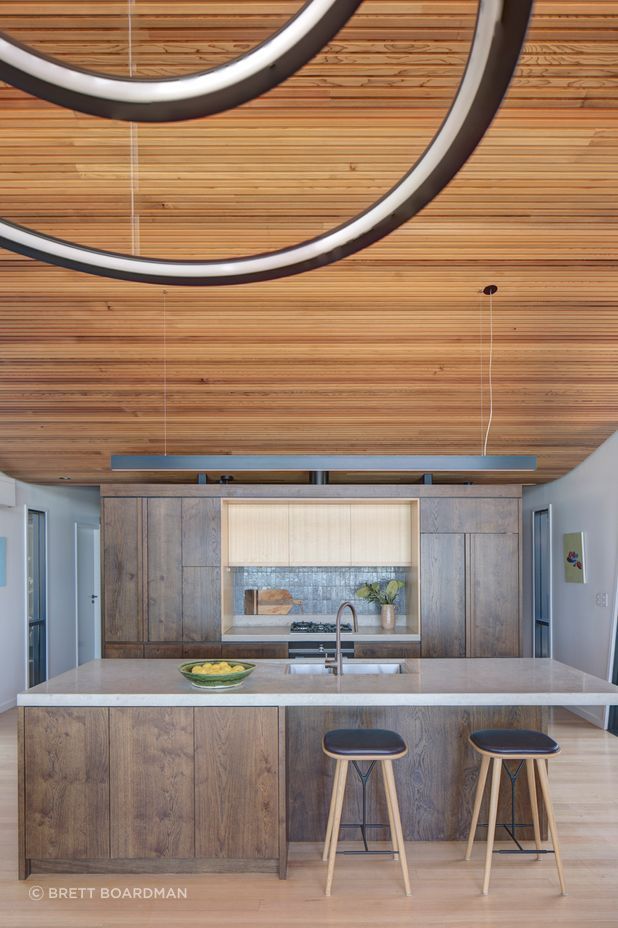 Task lighting has been installed over the kitchen island bench.