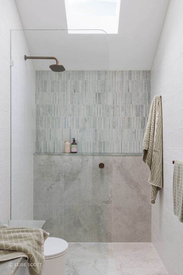 Curve Mini Marble Tiles in Ming pair with Pamir Light matt porcelain tiles in the Norsu Homes 2 project.