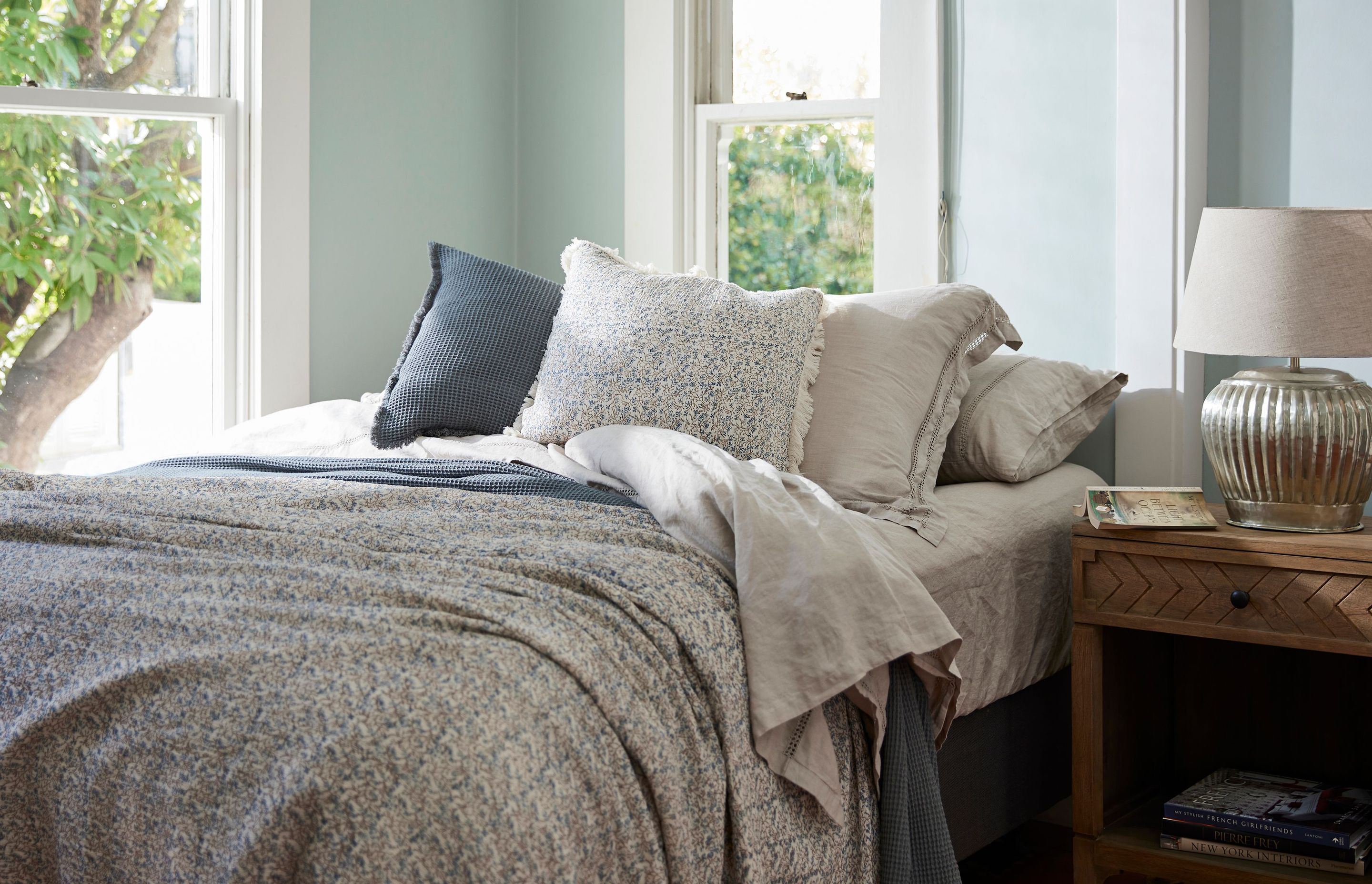 Powdery and pale blues inspired by the colours of the sky have been used in the bedroom to form a calming and restful space.