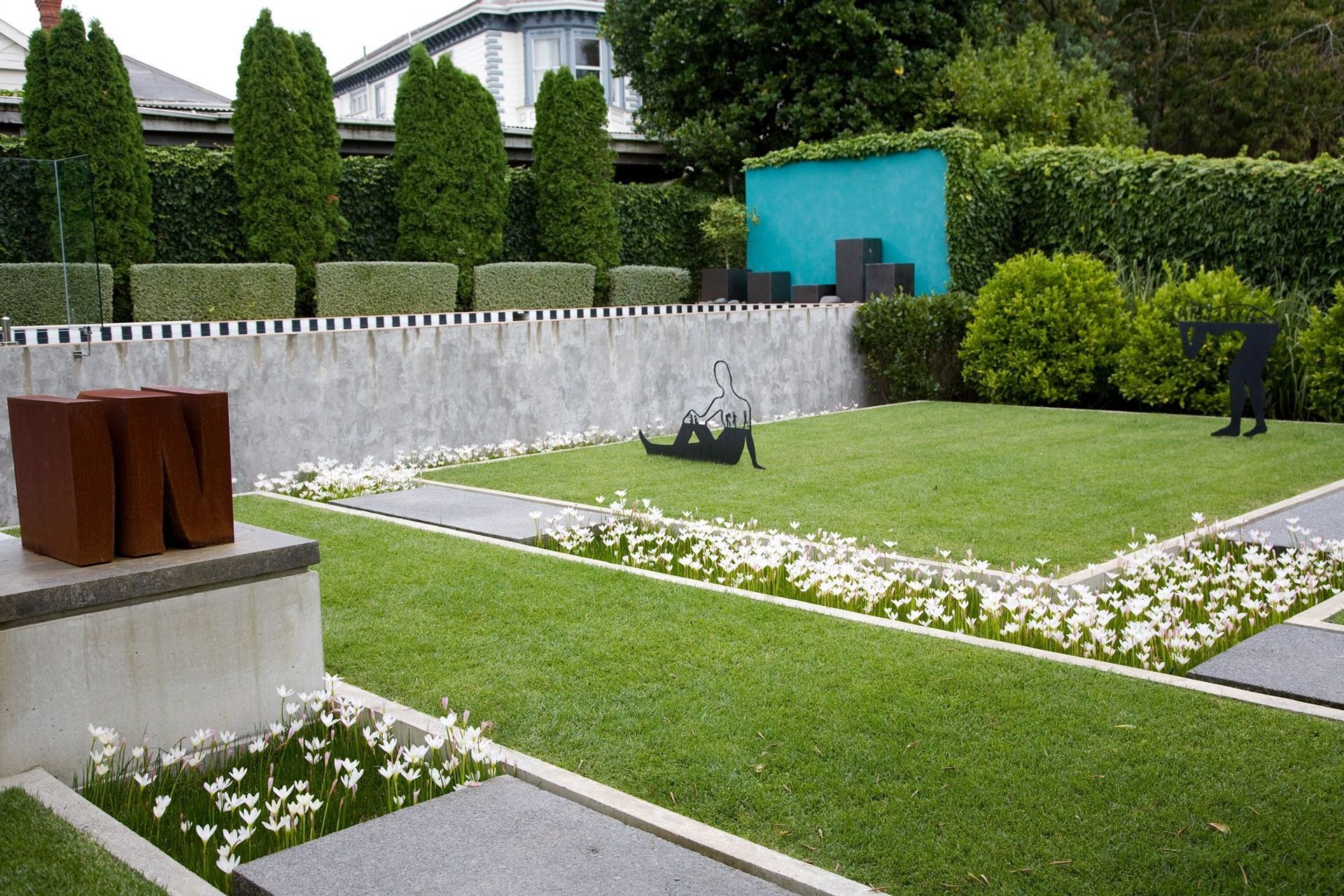 A unique garden in Remuera with a curated collection of fascinating sculptural art.