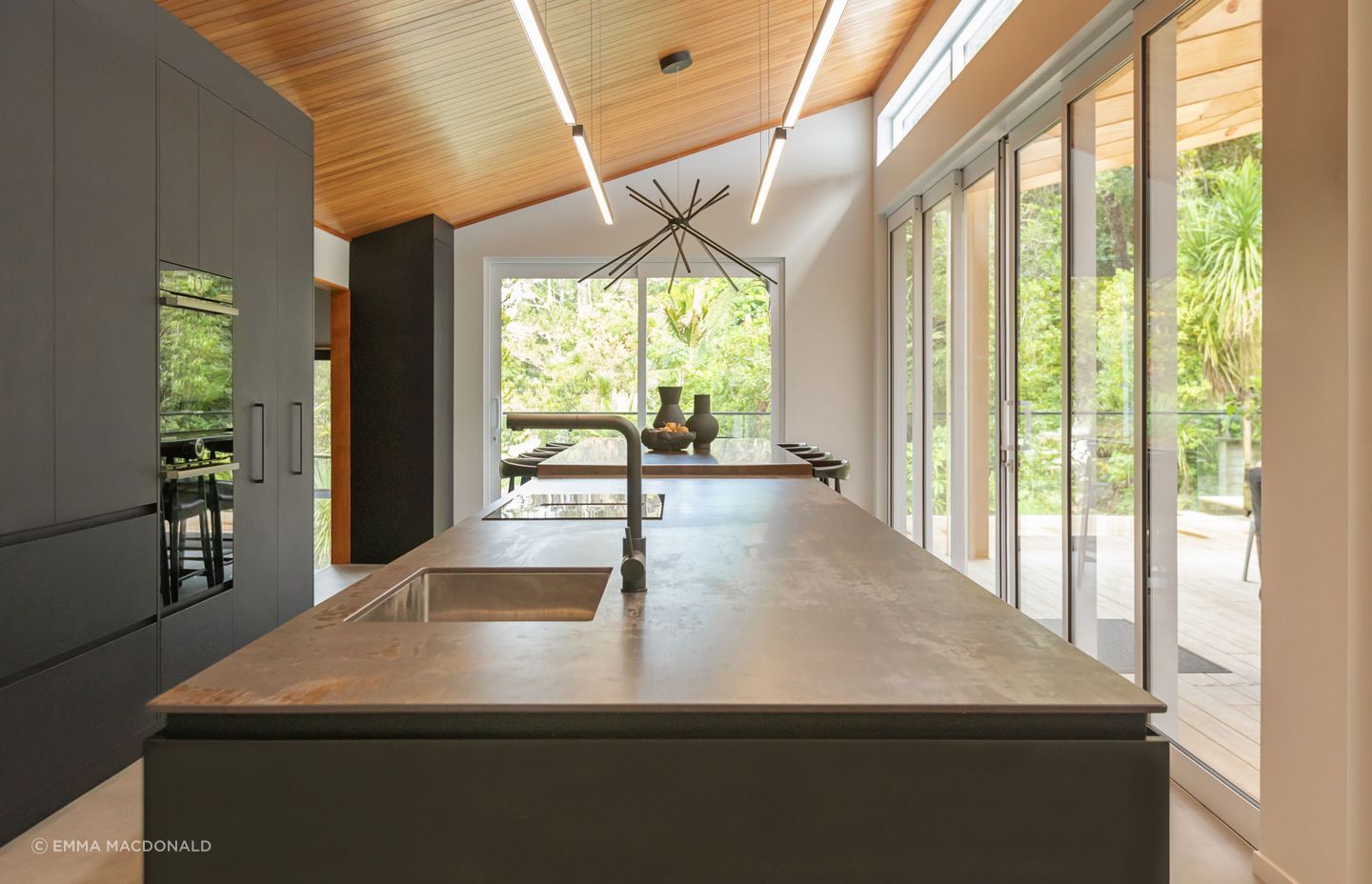 “A truly social kitchen needs space for everyone to gather and engage, so we removed the dividing wall between the kitchen and dining room to open up the space, and added a large island-cum-dining-table to allow for free-flowing interactions."