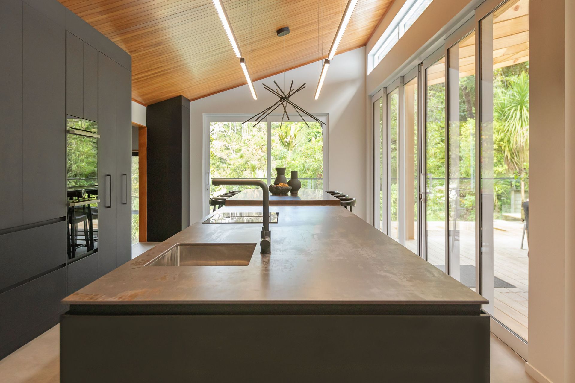 “A truly social kitchen needs space for everyone to gather and engage, so we removed the dividing wall between the kitchen and dining room to open up the space, and added a large island-cum-dining-table to allow for free-flowing interactions."