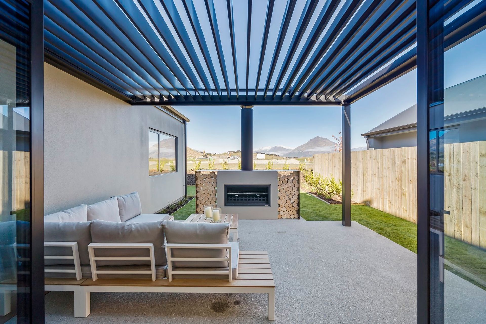 The SunPivot is a modern louvred roof that provides a seamless transition between indoor and outdoor spaces.