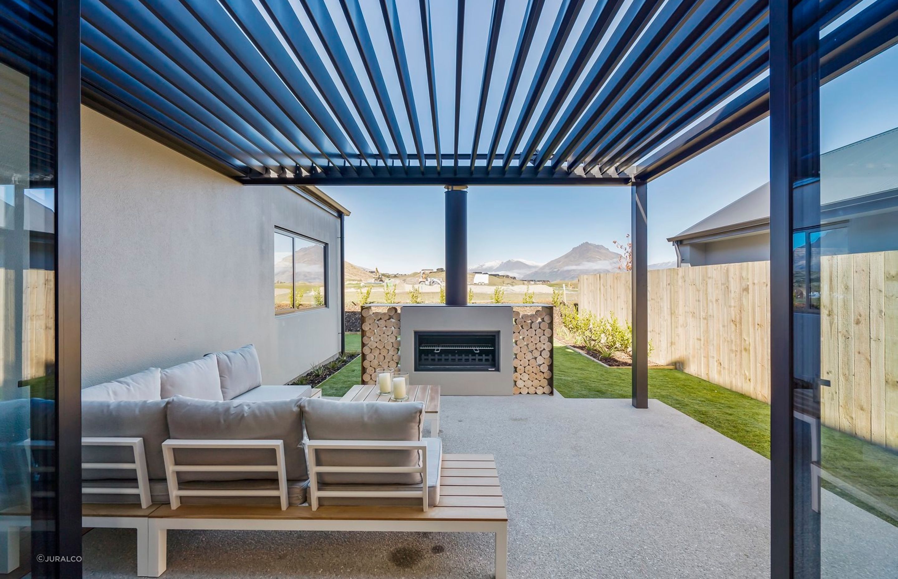 The SunPivot is a modern louvred roof that provides a seamless transition between indoor and outdoor spaces.