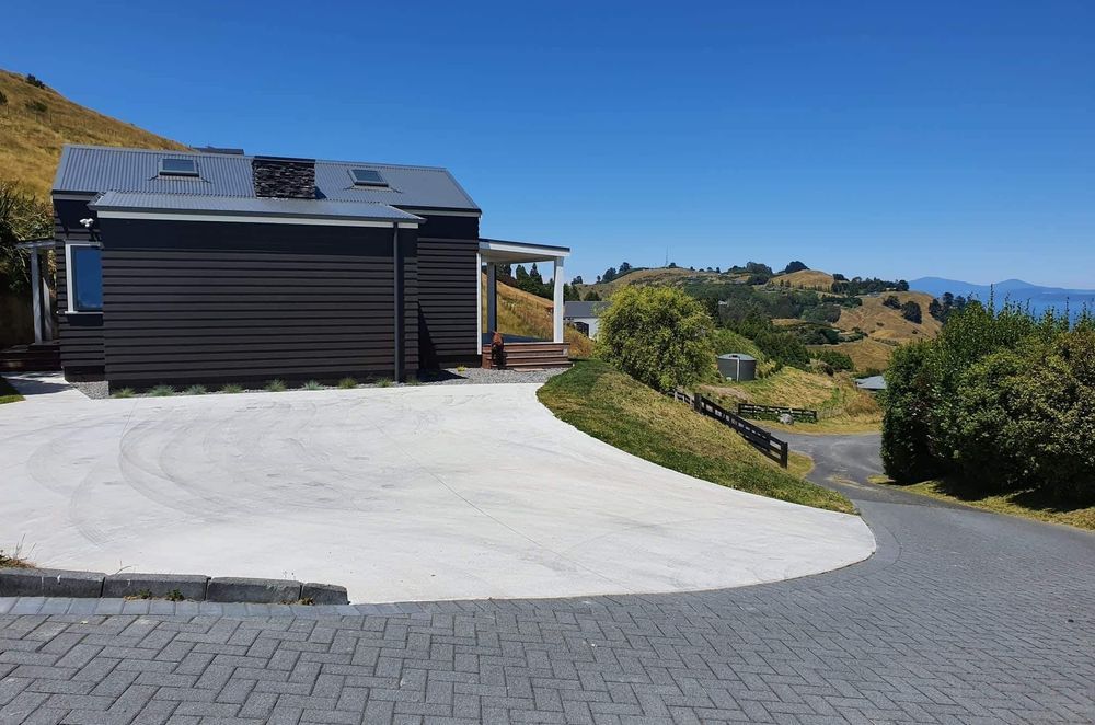 A covered deck at the front of the home extends the living space.