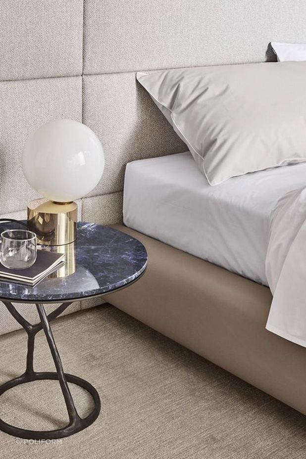 Exuding elegance, marble-topped bedside tables, like this Ilda Coffee Table, can be a standout piece in any bedroom.
