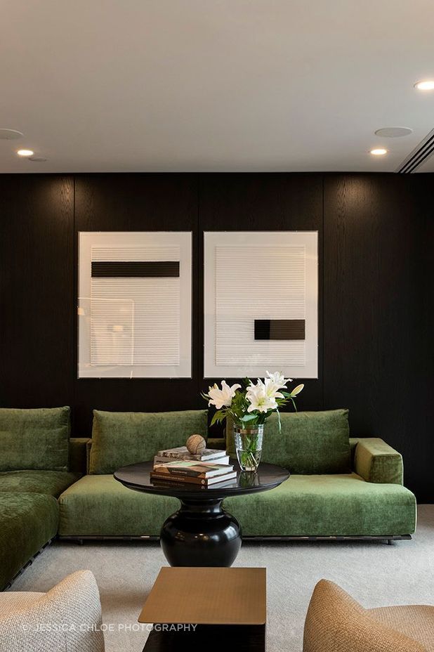 The contemporary furniture in this apartment is softened with timeless textures and finishes, complemented by personal touches and a thoughtful blend of ambient and task lighting.