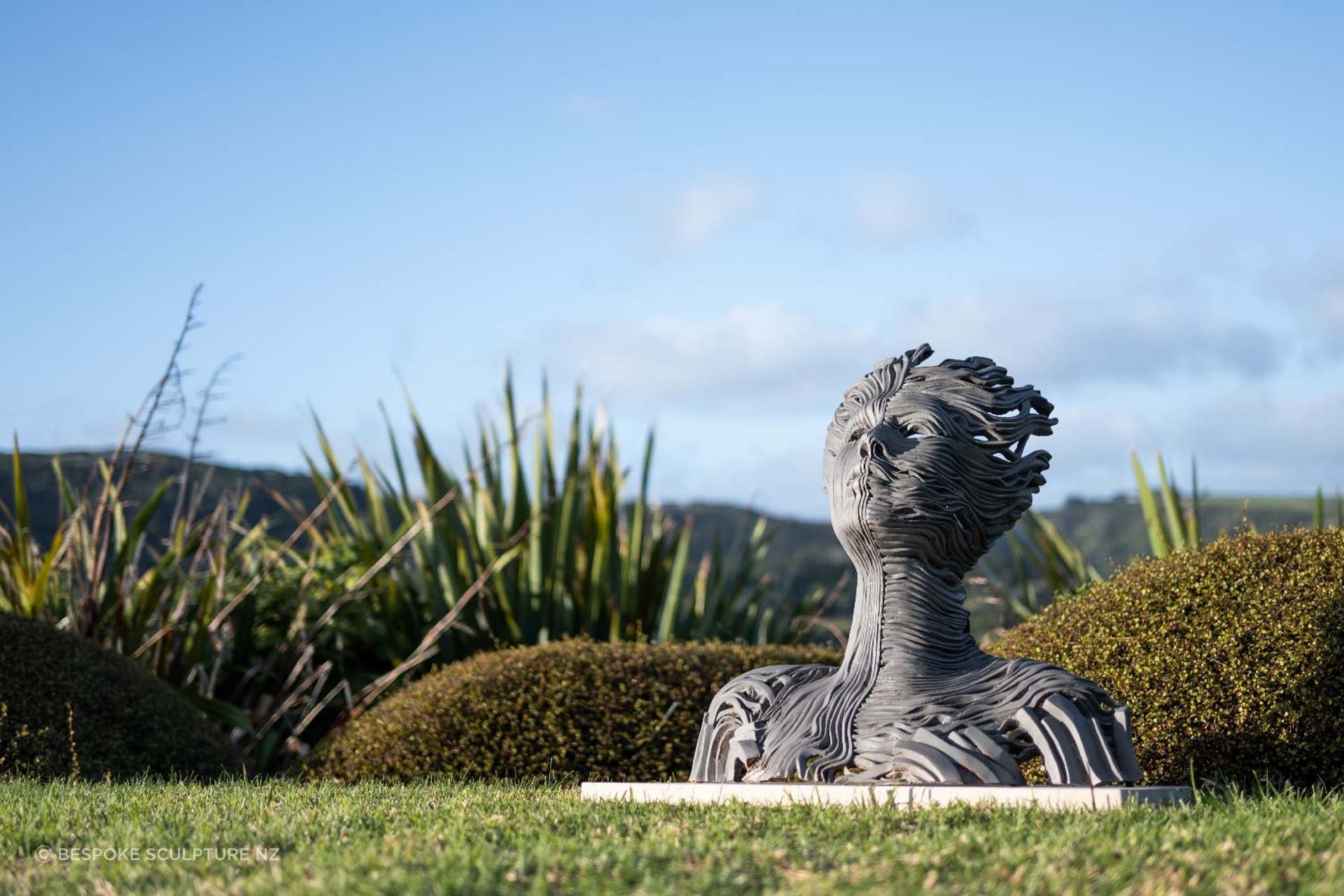 Beautiful textures and movement are expressed in the Layered Woman by Bespoke Sculpture NZ.