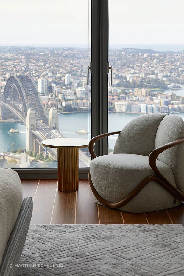 The Hug Armchair designed by Rossella Pugliati for Giorgetti, with the Allure side table by Baxter. Photo © Martin Mischkulnig