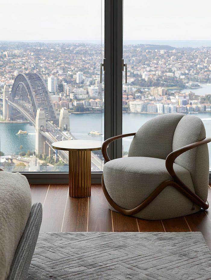 The Hug Armchair designed by Rossella Pugliati for Giorgetti, with the Allure side table by Baxter. Photo © Martin Mischkulnig