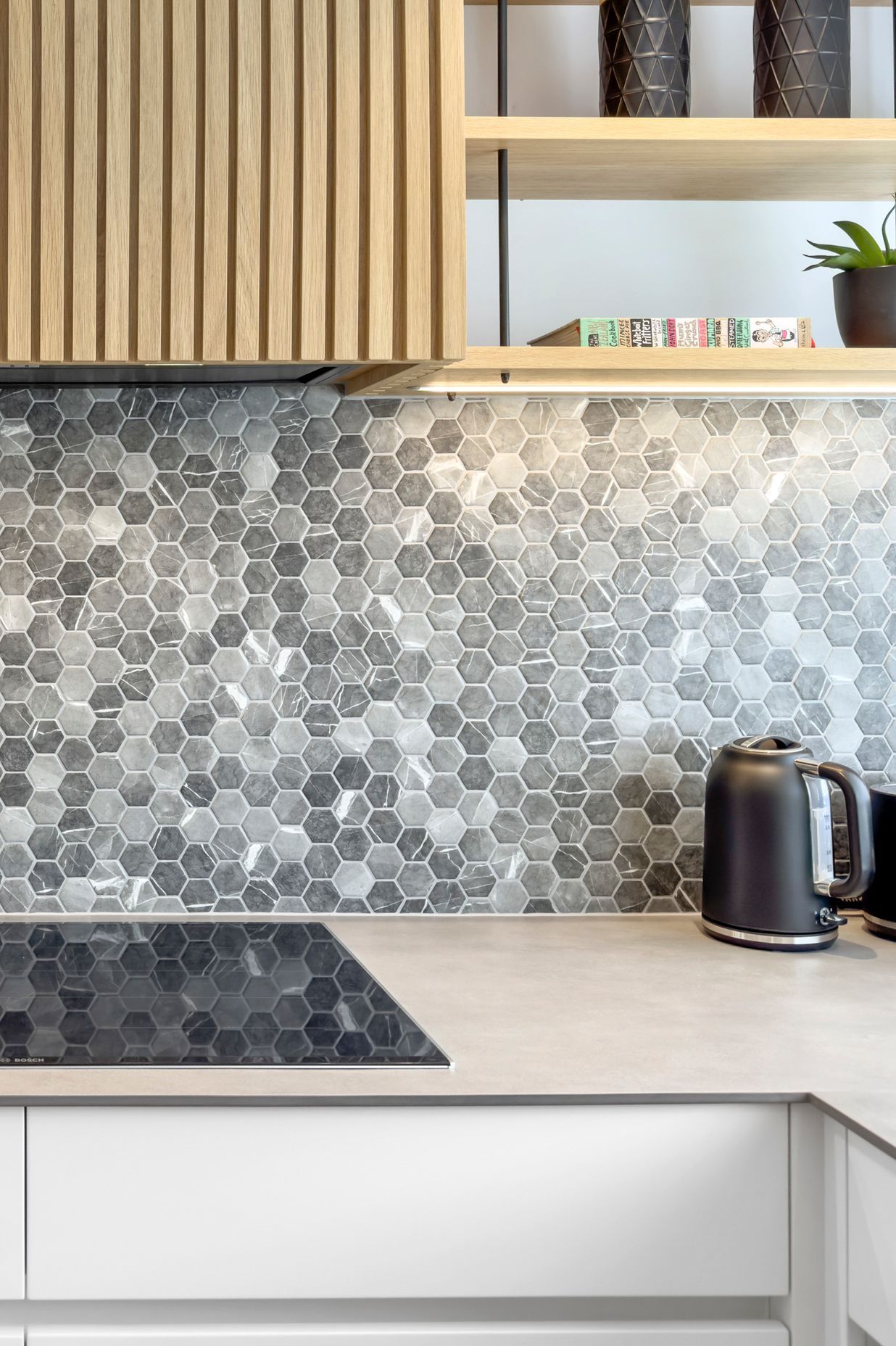 Mosaics are a versatile design that can be used in kitchens and swimming pools alike.