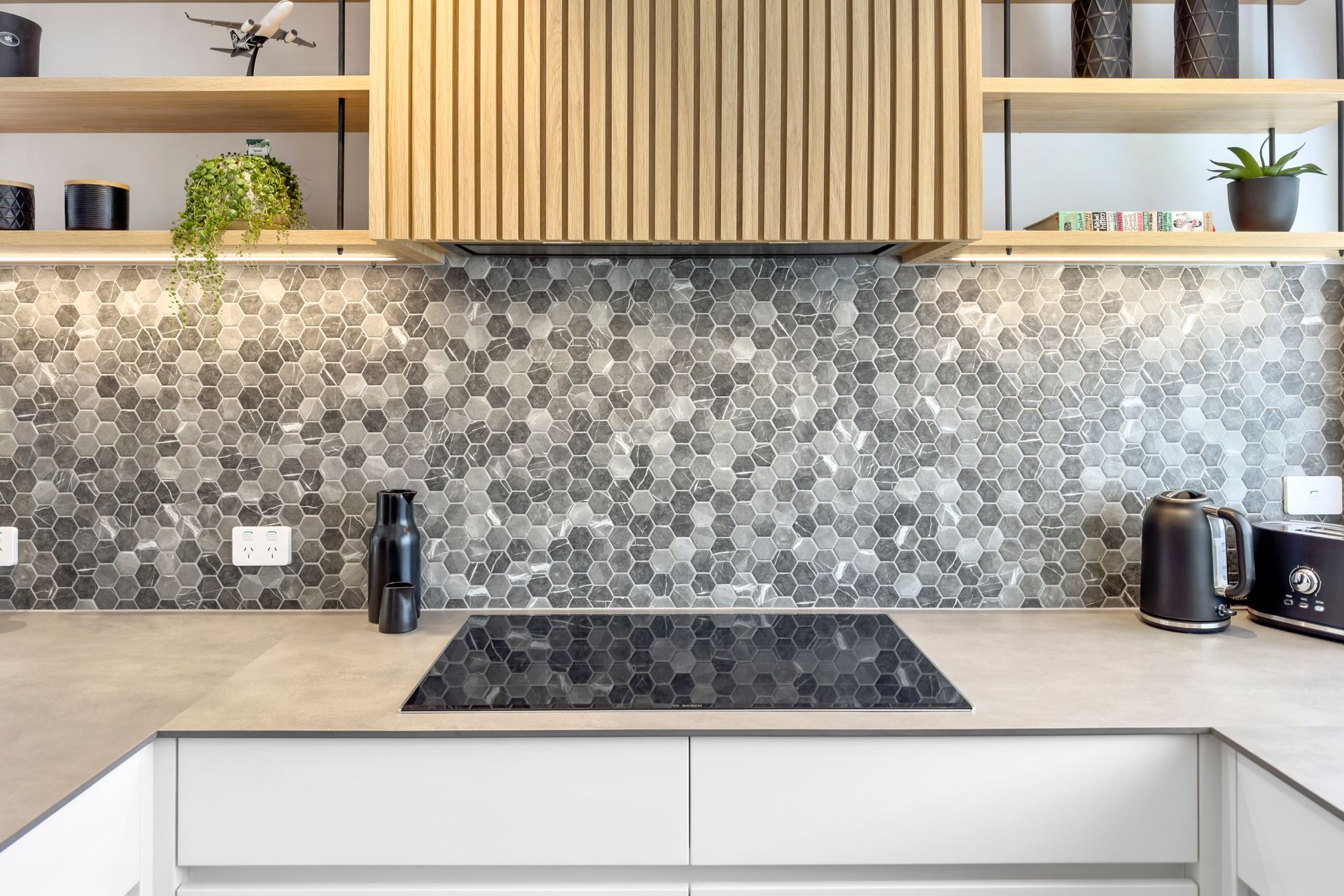 Mosaics are a versatile design that can be used in kitchens and swimming pools alike.