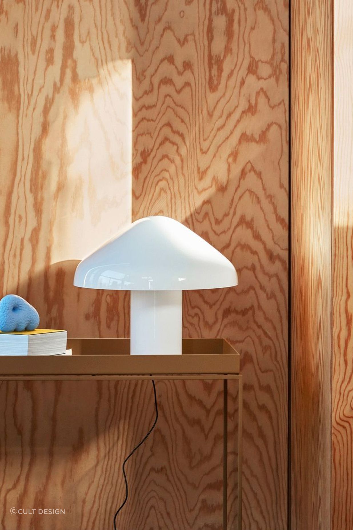 The Pao Glass Table Lamp by HAY conveys warmth and style