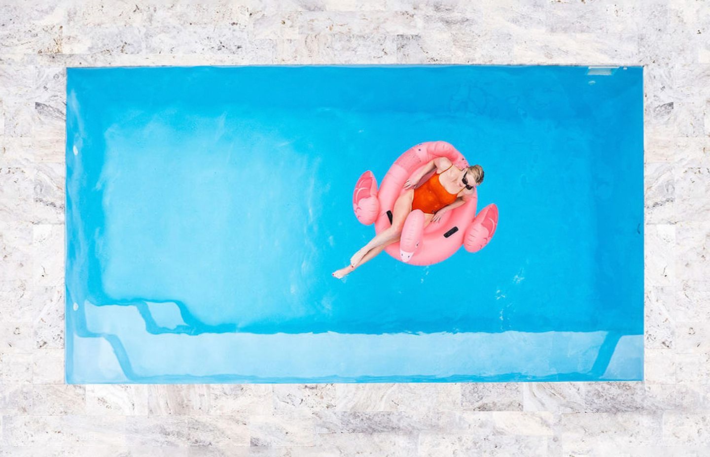 A great example of the classic rectangular shaped pool with the stylish Capri Pool from The PoolHouse.