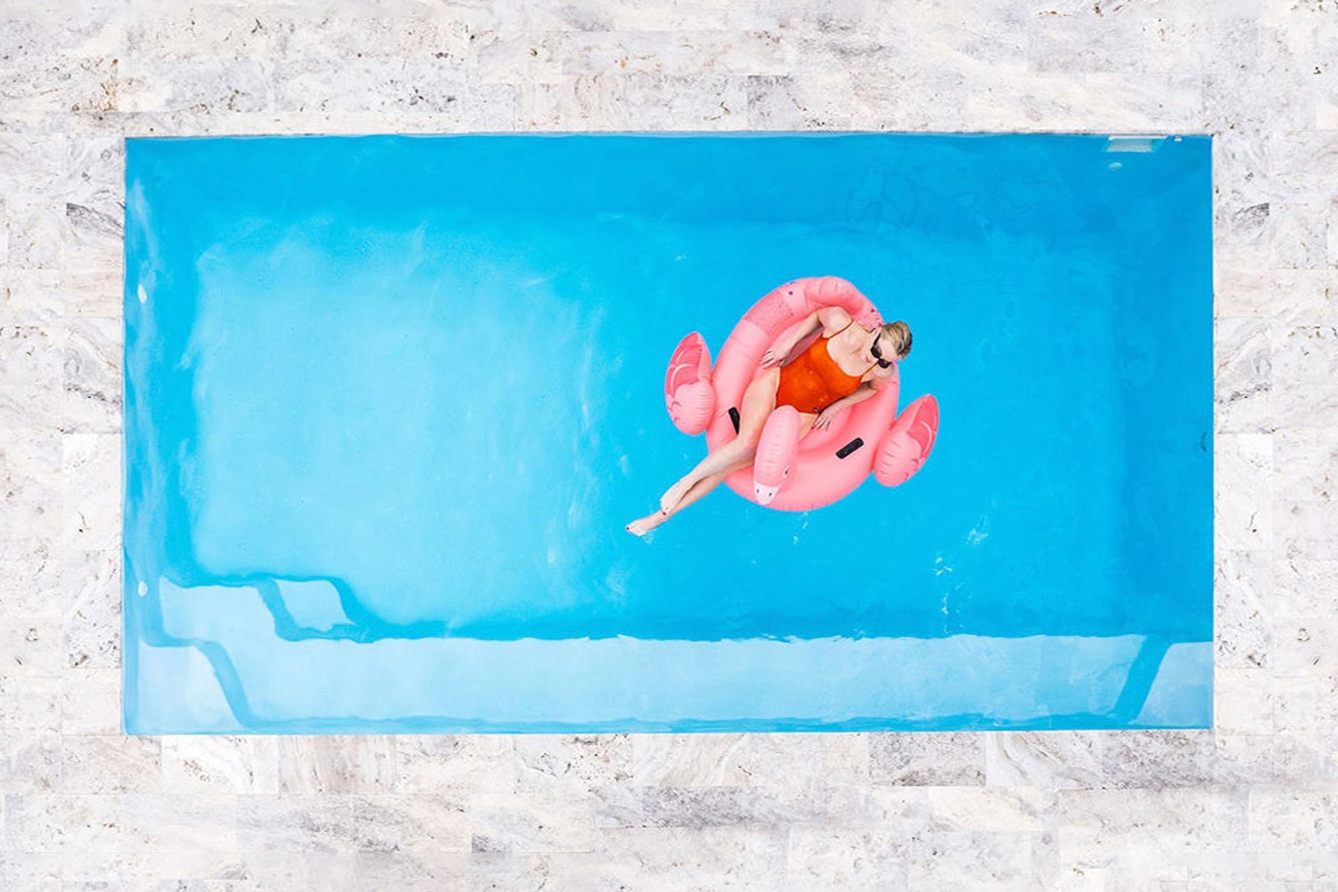 A great example of the classic rectangular shaped pool with the stylish Capri Pool from The PoolHouse.