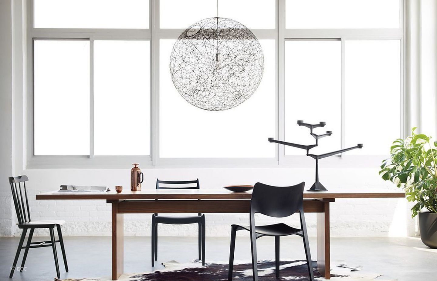 A statement centrepiece, like this Spin Table Candelabra Candle Holder, can add a bit of dining room drama.