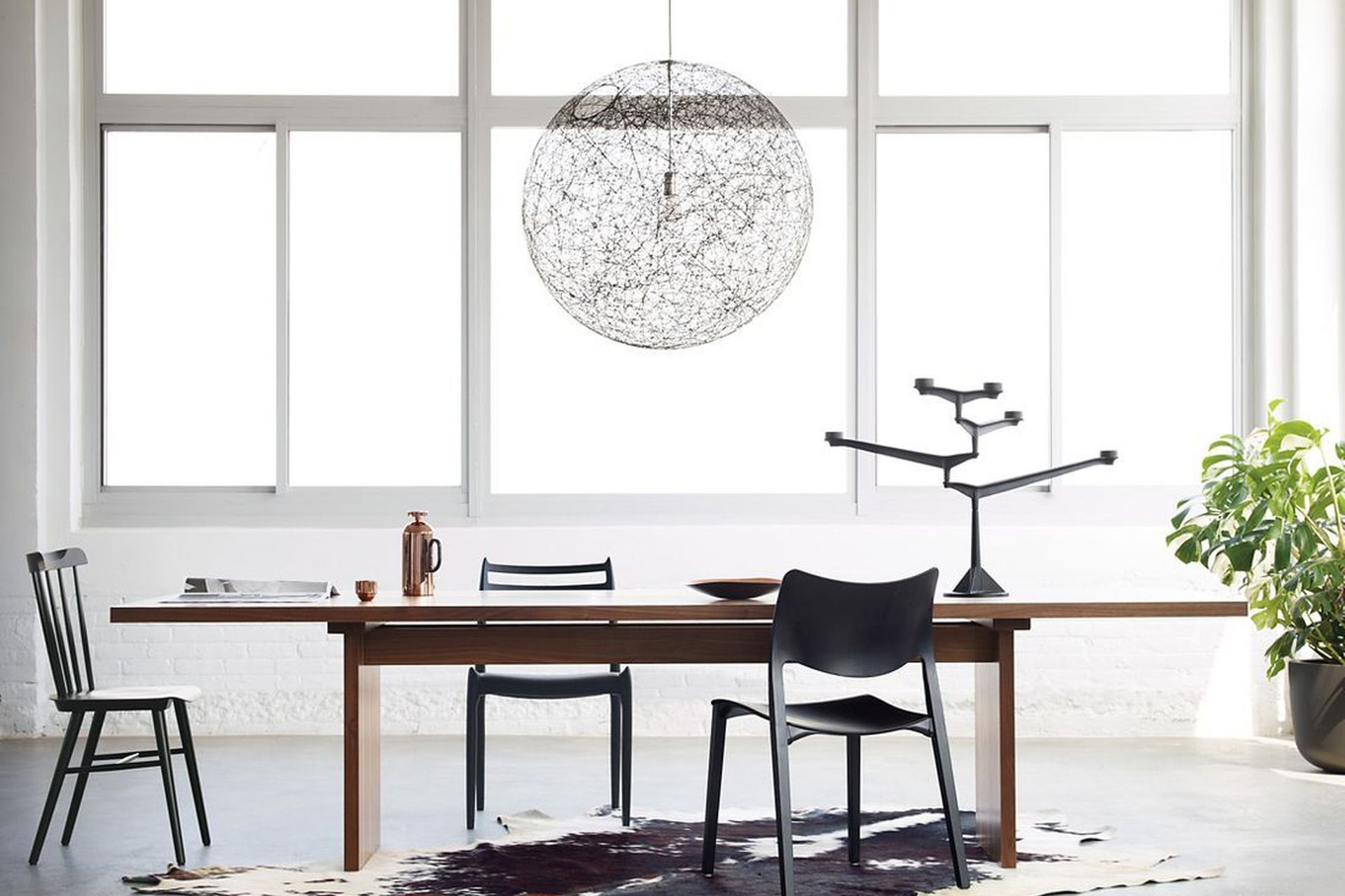 A statement centrepiece, like this Spin Table Candelabra Candle Holder, can add a bit of dining room drama.