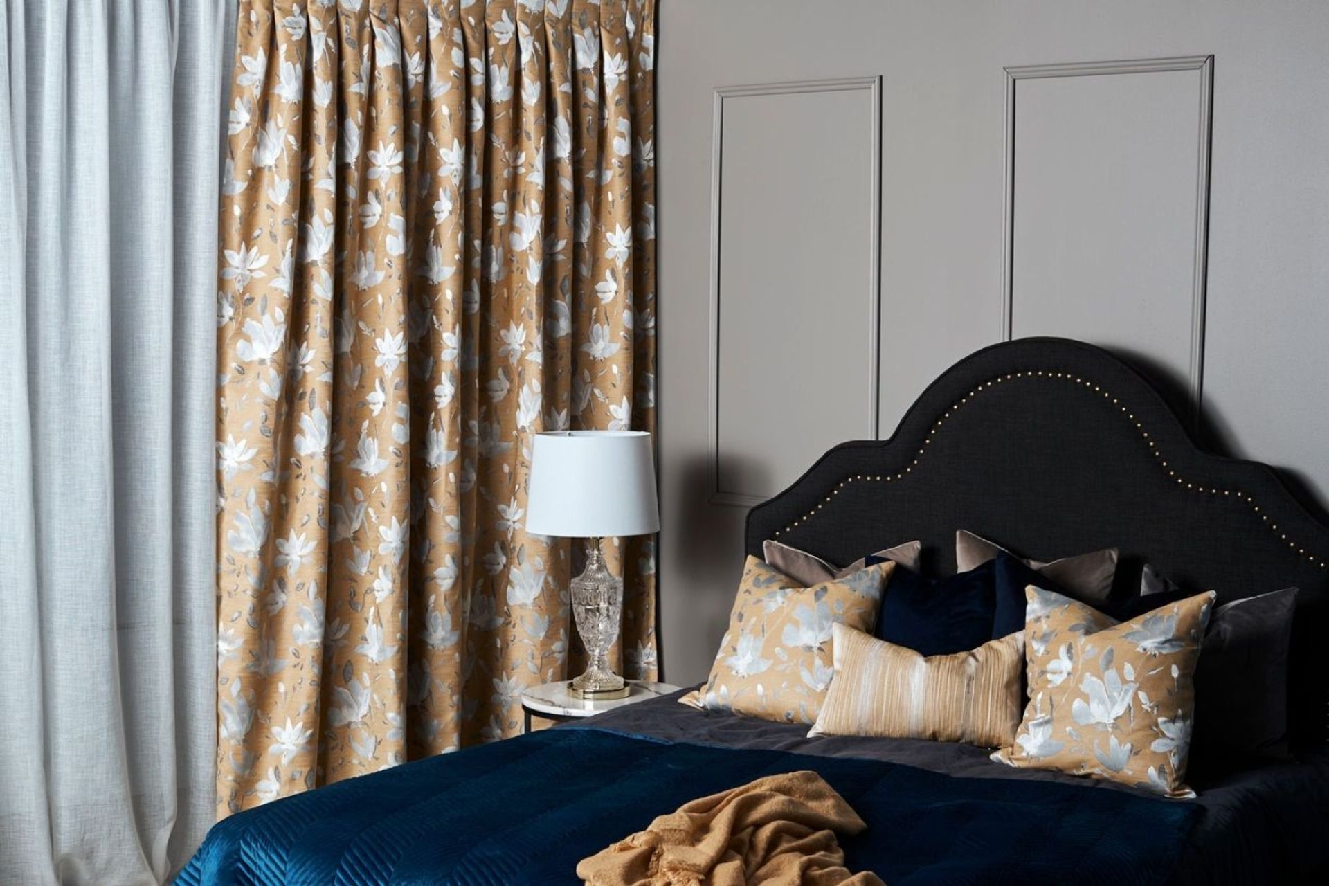 High-quality drapery, like this Santa Cruz by Maurice Kain Drapery, will help keep noise outside the home.