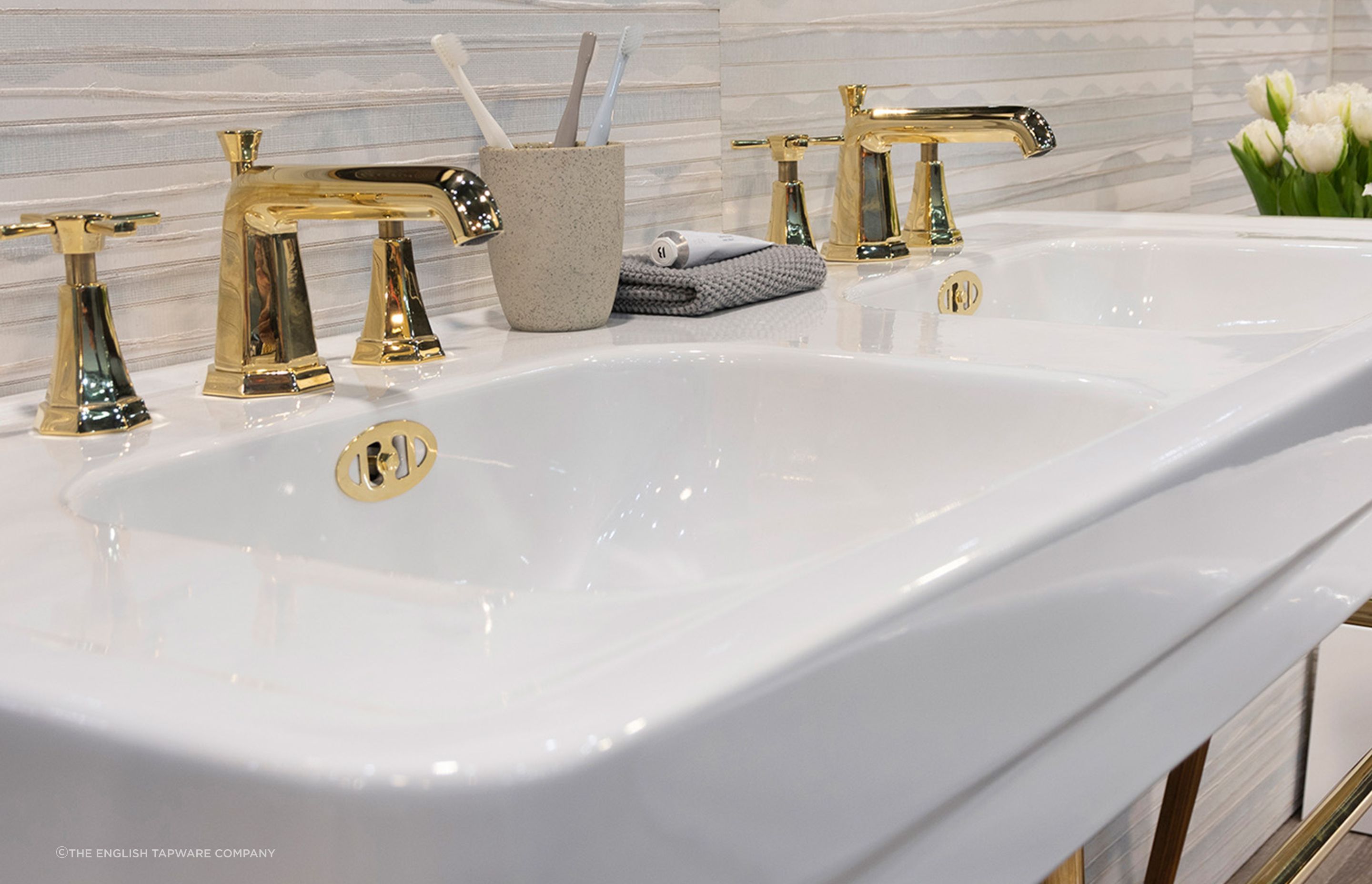 A console sink like the Soho 1300 Double Basin
by The English Tapware Company, brings vintage flair to a space.
