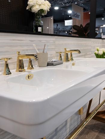 A console sink like the Soho 1300 Double Basin
by The English Tapware Company, brings vintage flair to a space.