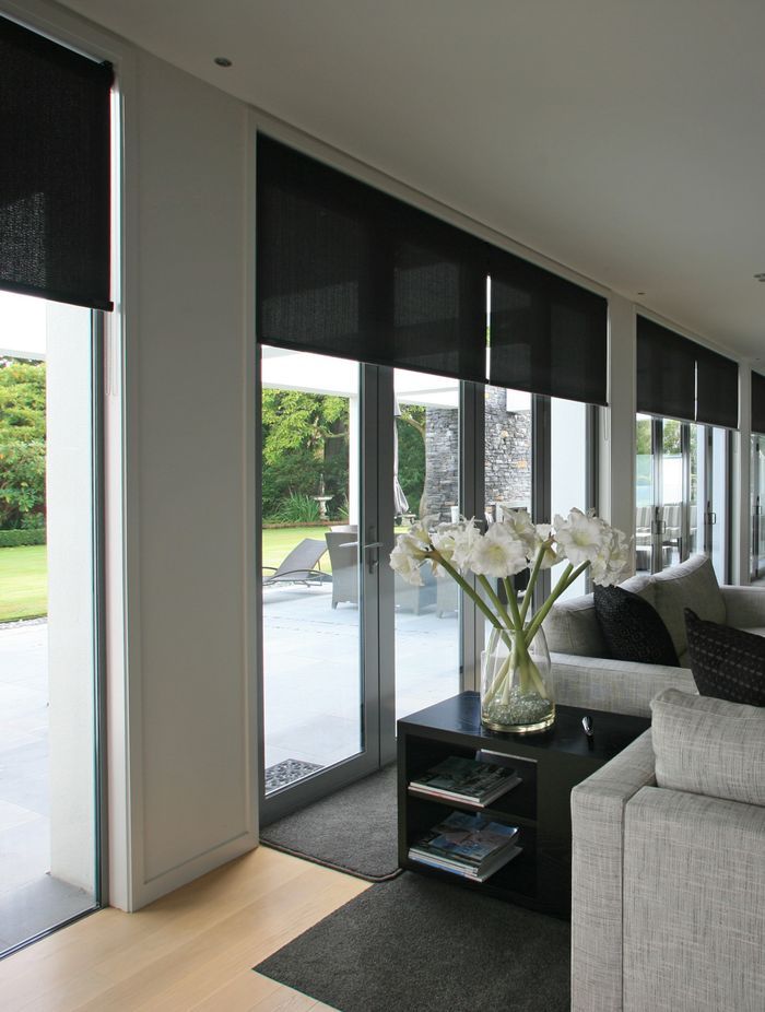 Sunscreen roller blinds are both sleek and functional.