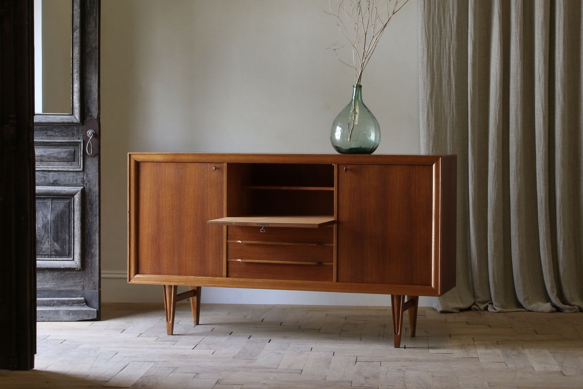 Rich aesthetics and practical storage are traits that come to the fore with the Swedish Mid-Century Sideboard.