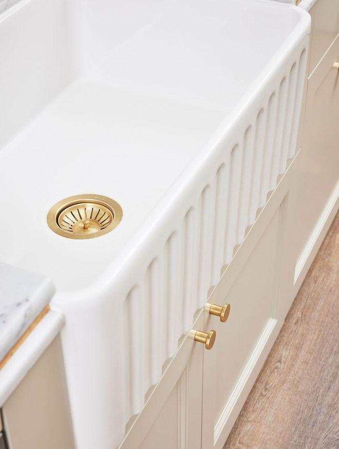 The Turner Hastings Novi Ribbed Farmhouse Butler Sink in Gloss White is stylishly distinctive and practical.