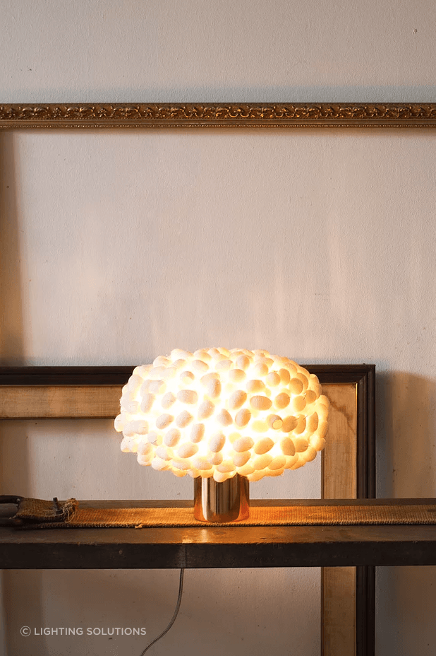 The delicately beautiful individual silk cocoons of the Unit Table C Table Lamp by Ango is a wonderful unique feature.