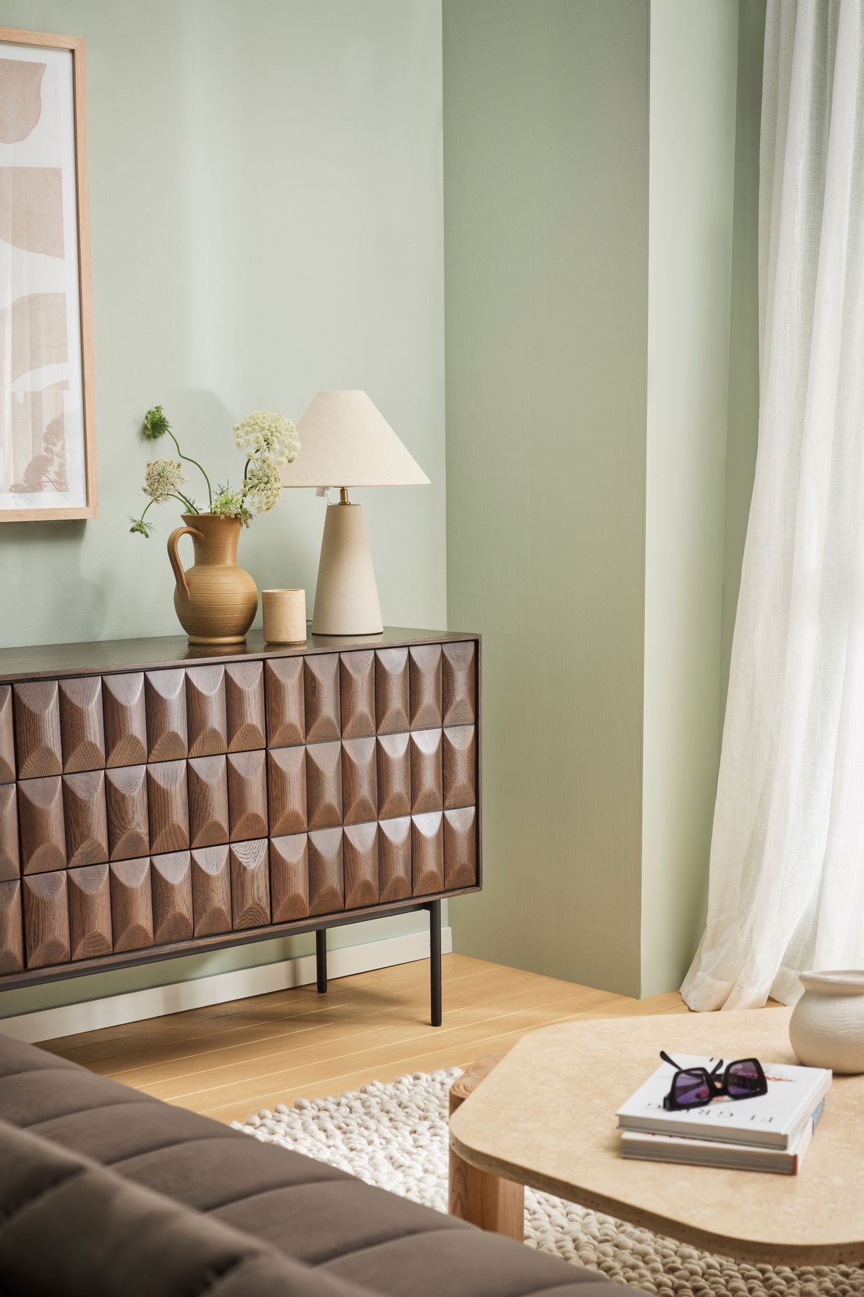Create depth in your living room by enhancing your panelling with a stronger hue to your walls.