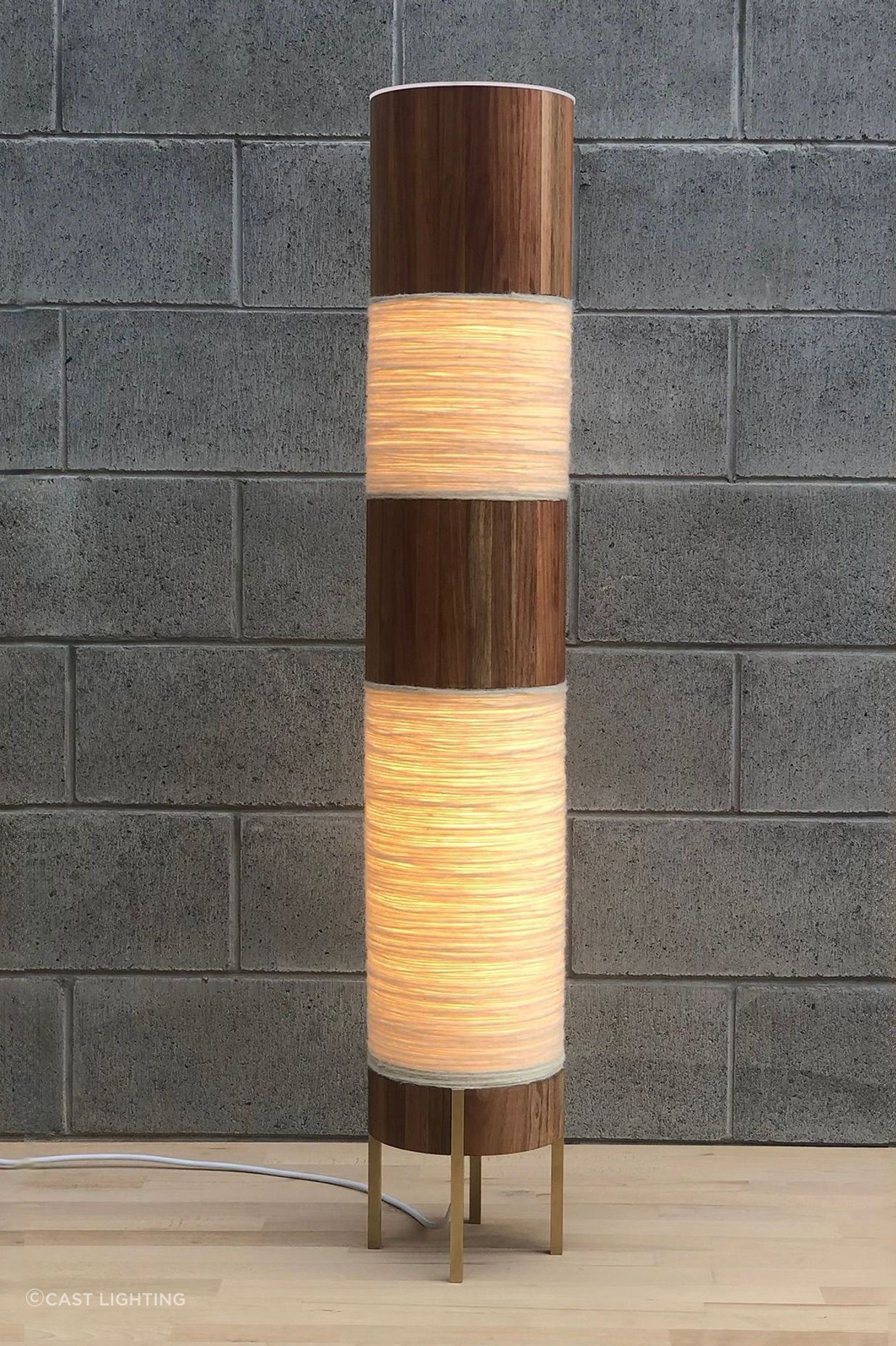 “I’ve crafted several handmade tools and techniques to make my lighting forms unique. These tools include a hand-cranked wool winder to spin and bond wool to cylinder templates, an electric post-sander to sand along the inside of timber curved forms and an adjustable LED light source that lights up cylinders around the complete 360 degrees.”