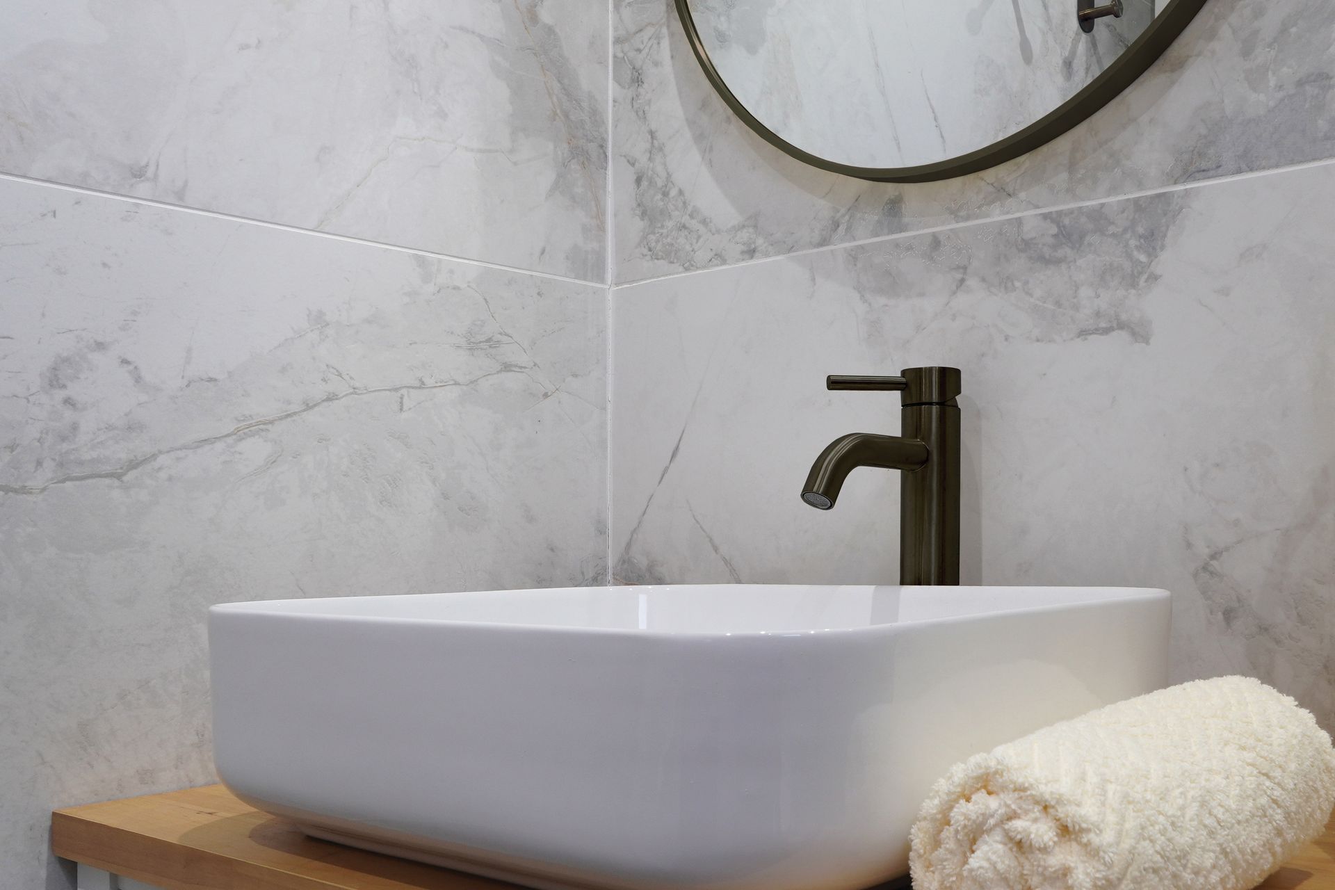 Embrace a minimalist palette to create the illusion of space.