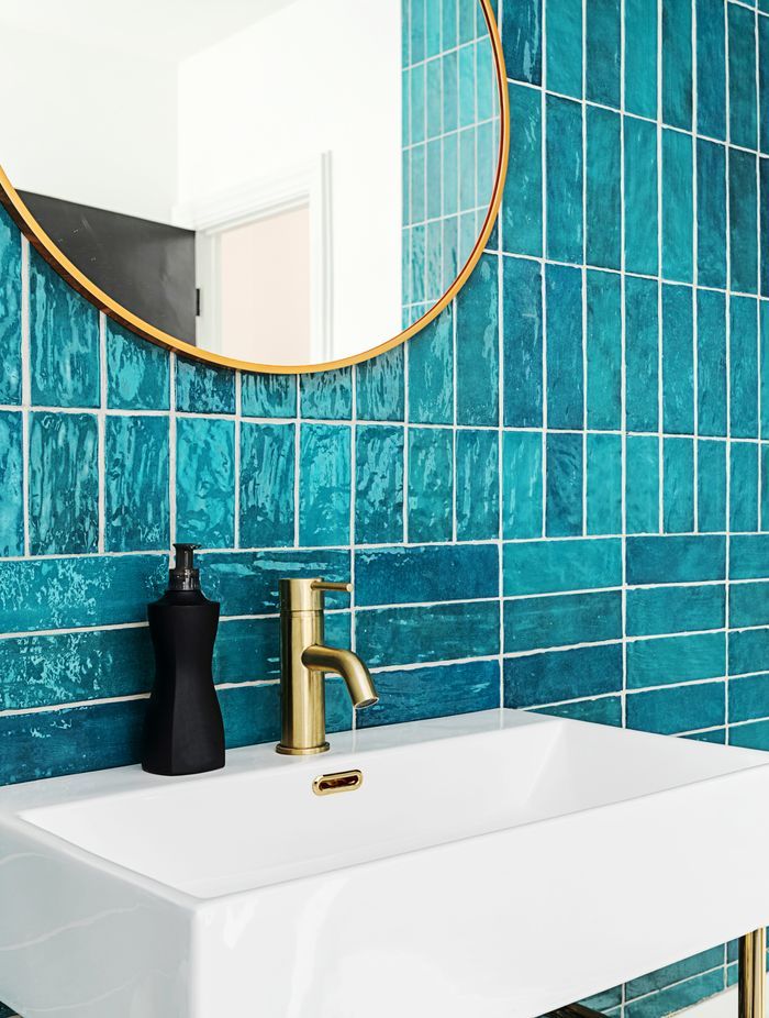 Select compact fixtures like Voda Plumbingware's Mini Basin Mixer in Brushed Brass.