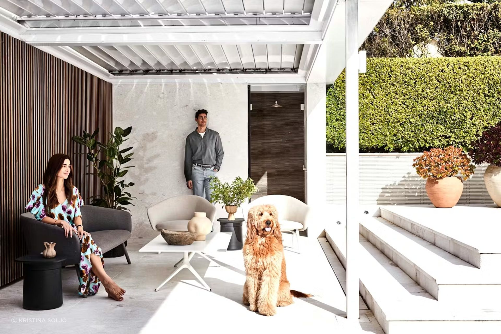 Lara, Marco and Kramer in the new outdoor sitting area. Kristalia ‘Tenso’ chairs and sofa, ‘Elephant’ coffee table, and ‘Degree’ side table, Fanuli.