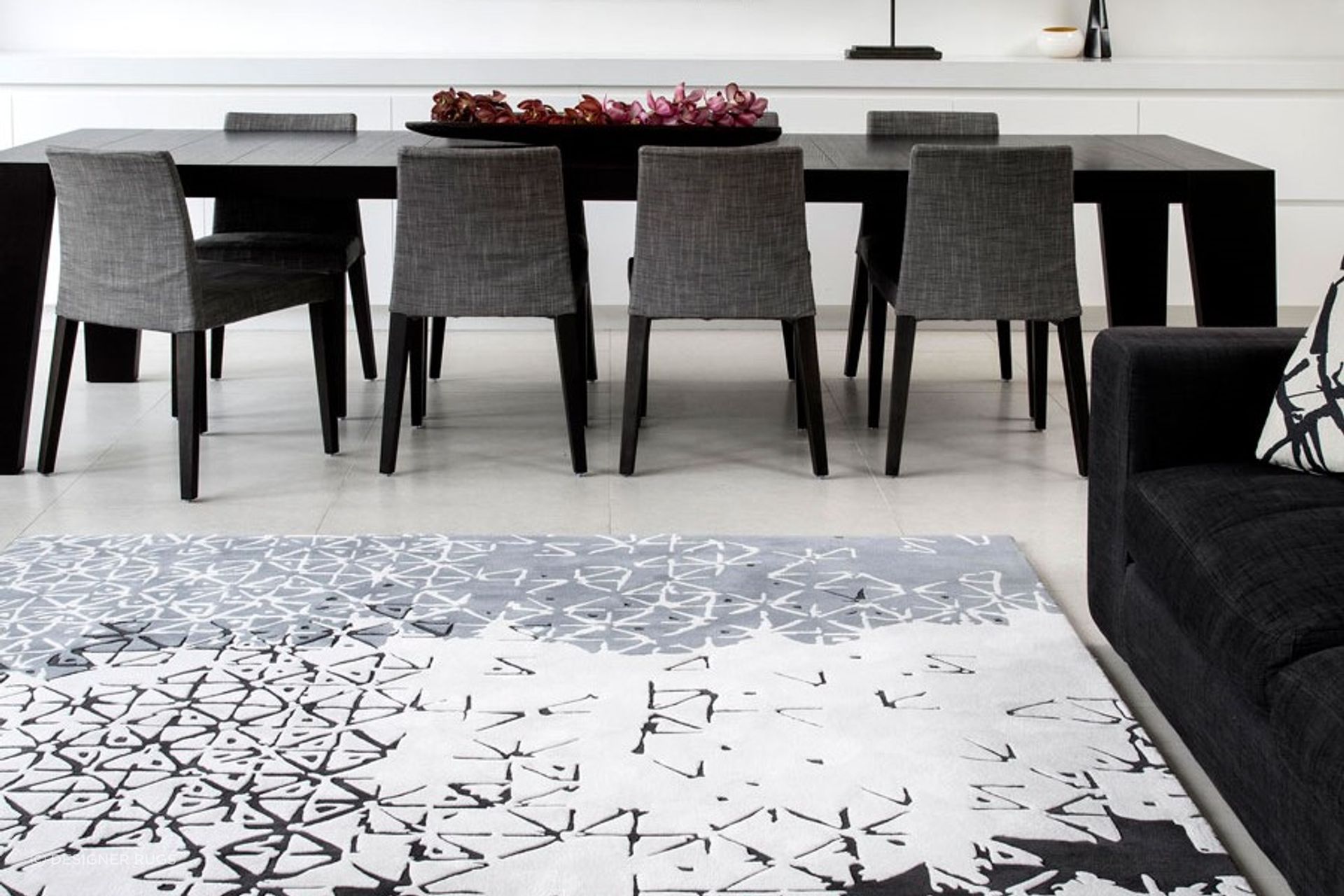 Adding warmth and comfort to an open living space with the Batik Ubud, made from Hand tufted in 100% New Zealand Wool