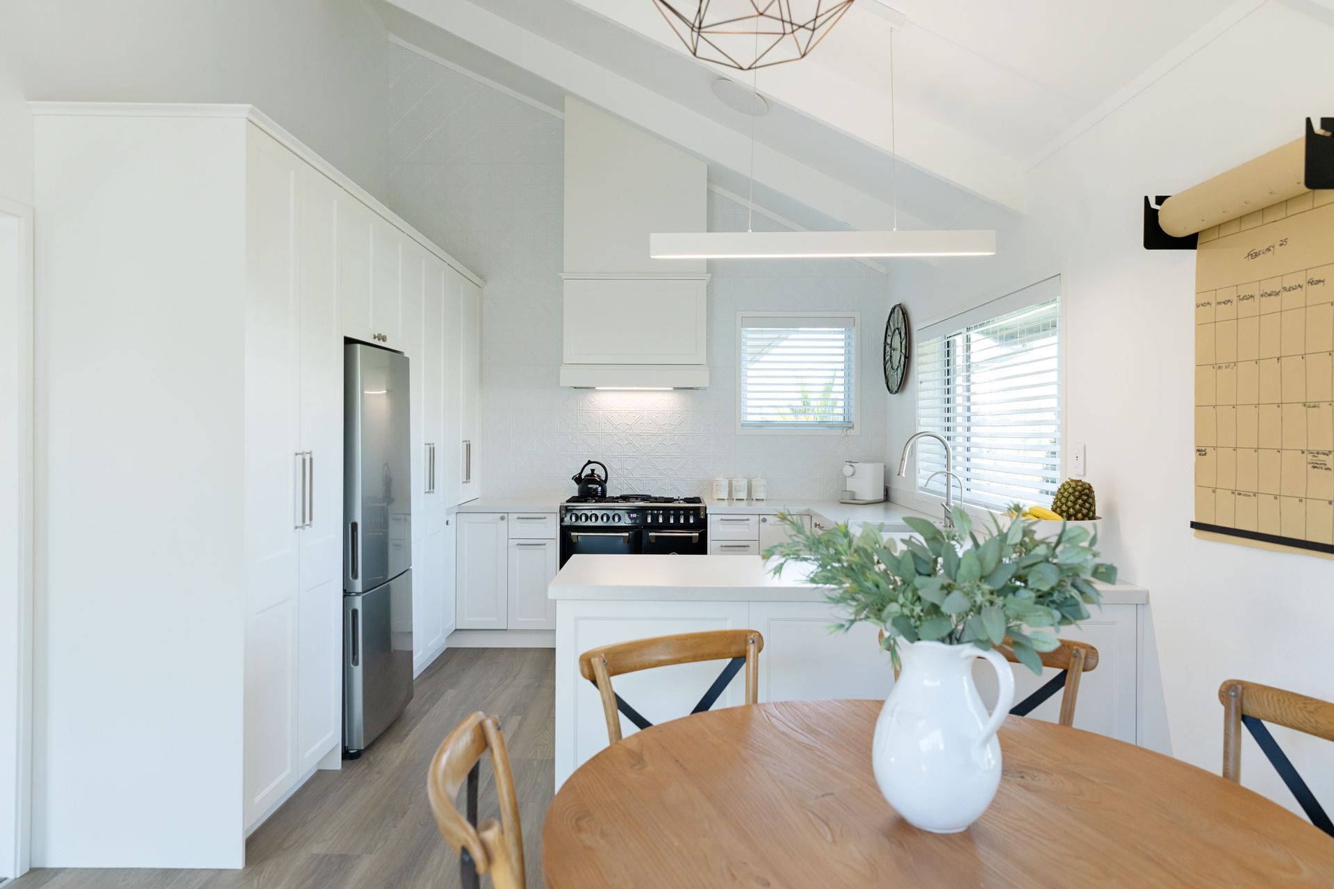 “The client wanted a space that welcomed her home, inviting her to indulge in cooking everyday meals and entertain friends and family."