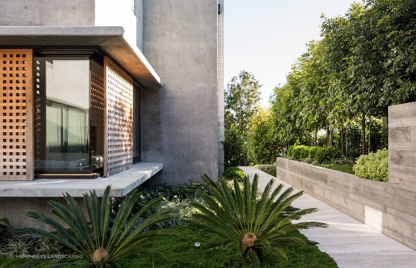 A bold contrast of building and landscaping materials has a striking impact on one and all.