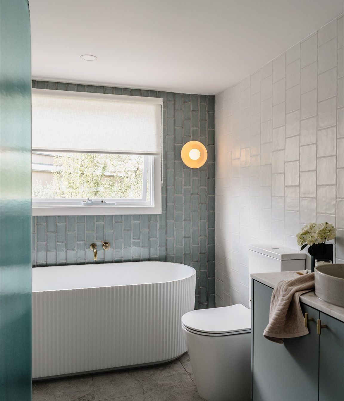 Norsu Cabin was thoughtfully renovated with the bathroom transformation featuring Studio Menta Gloss paired with Port White Matte on the walls and Pamir Light tiles on the floors.