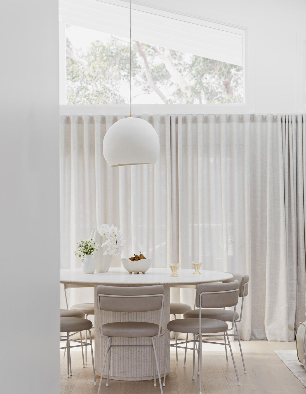 Lighting should be proportional to the table’s dimensions and shape.