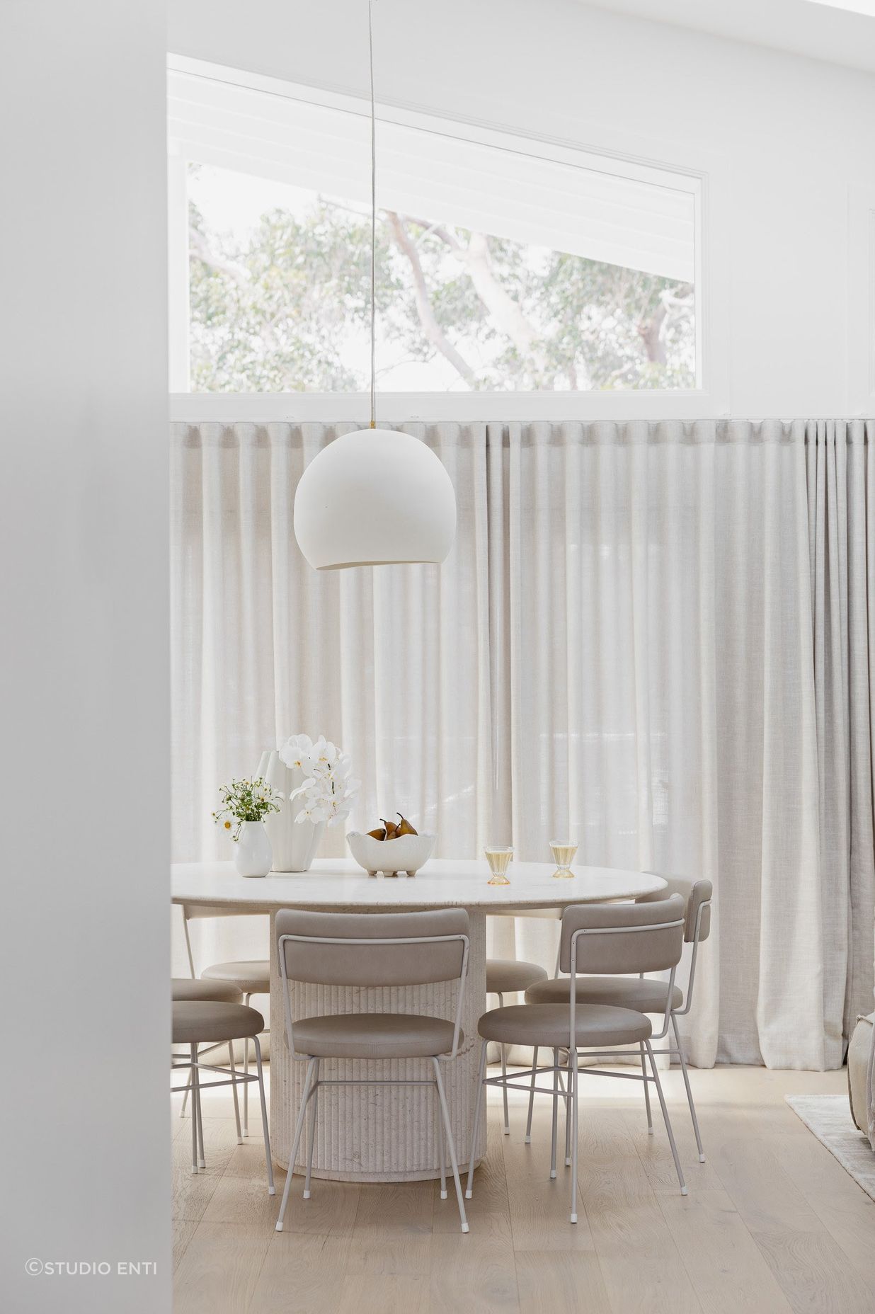 Lighting should be proportional to the table’s dimensions and shape.