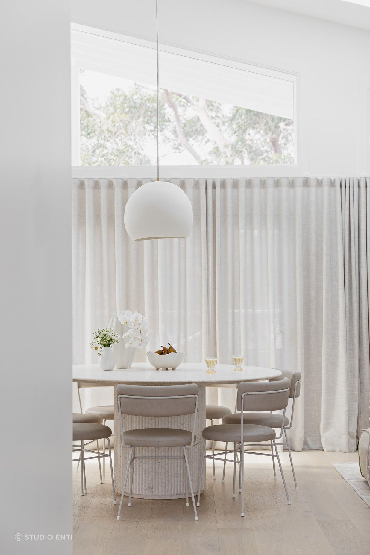 Lighting should be proportional to the table’s dimensions and shape.