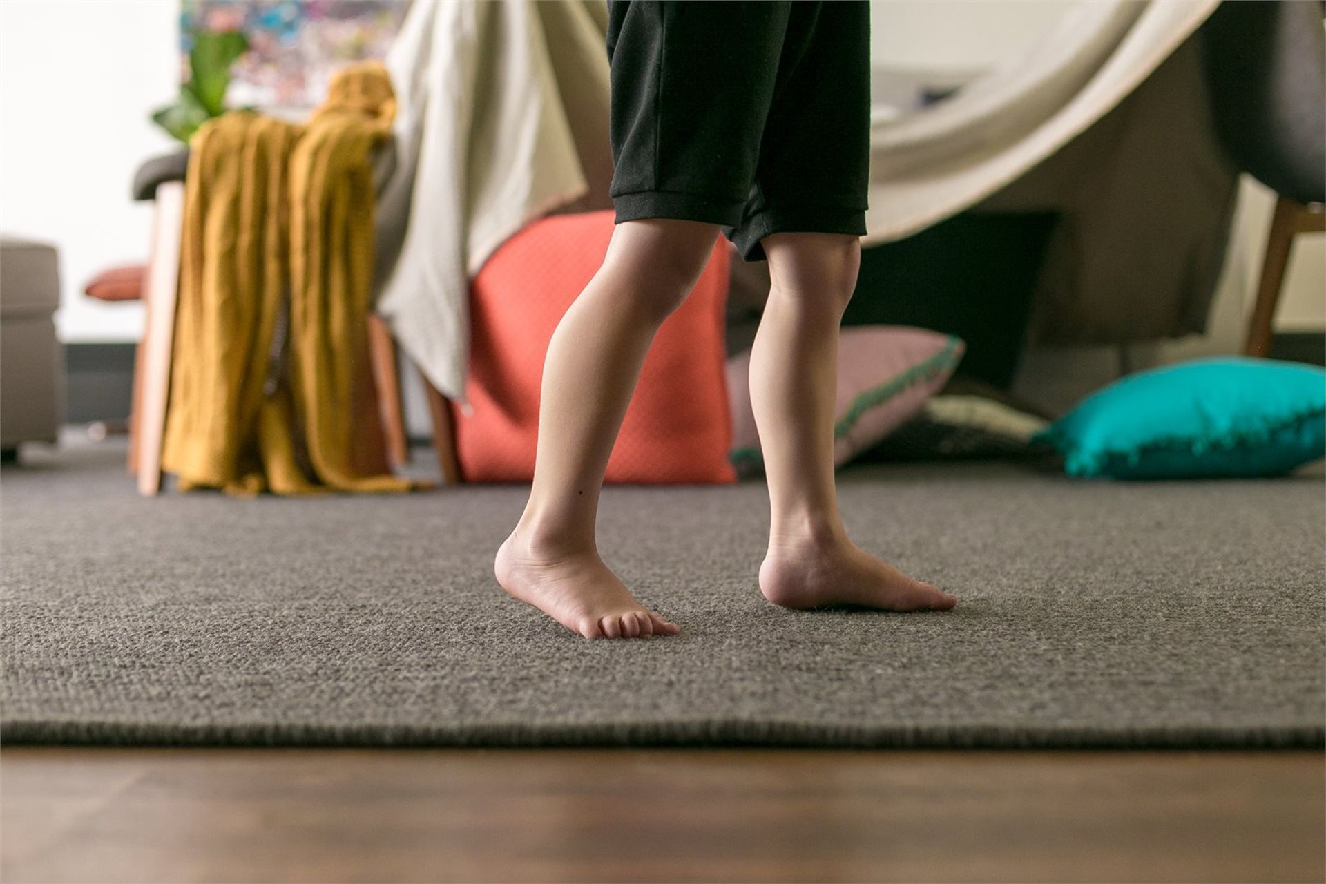 Dark coloured rugs like the Untouched Rug are often a solid practical choice when kids and pets are involved