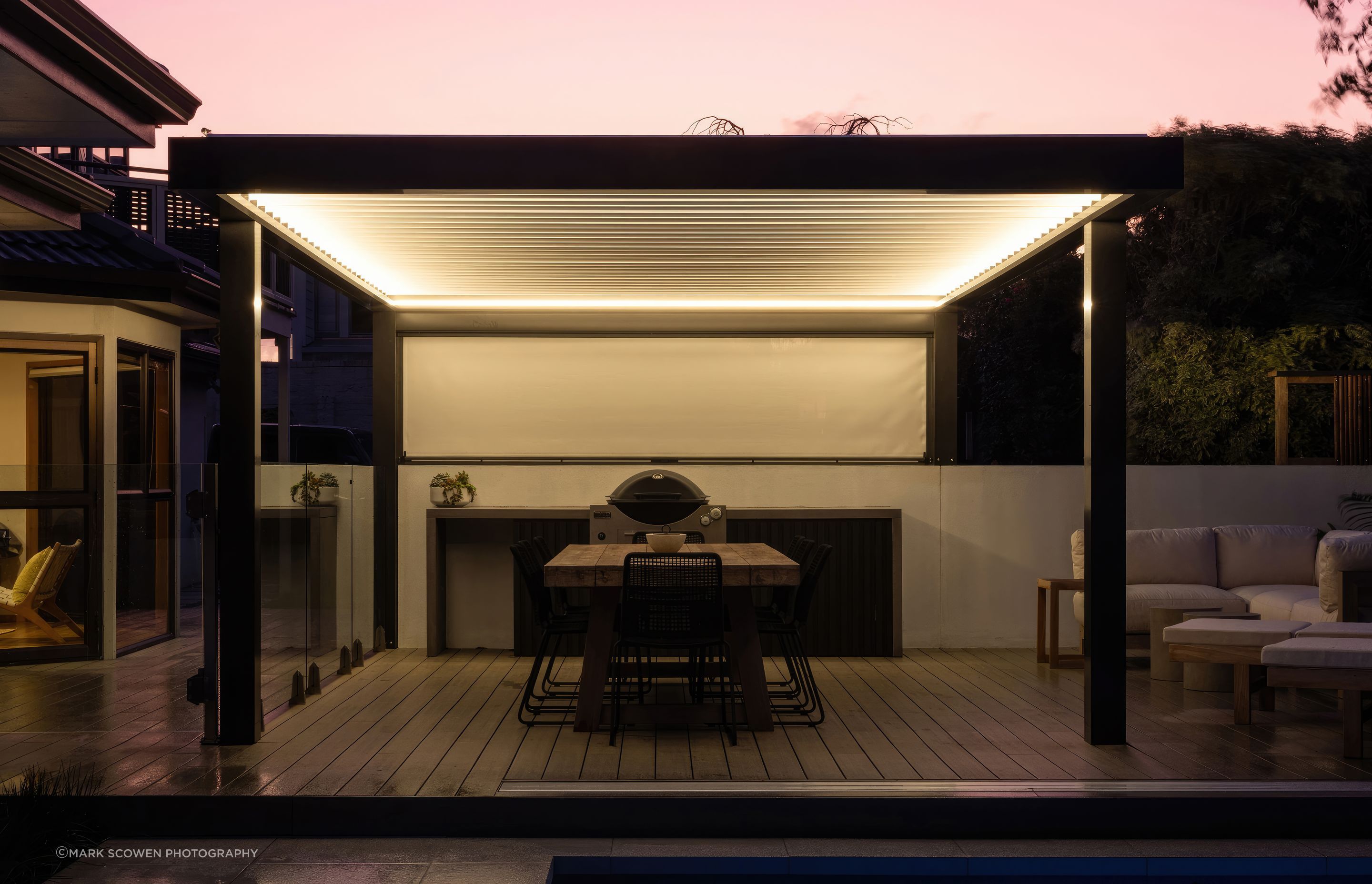 Pull-down blinds are available in sunshade mesh and PVC to protect from the elements and create privacy when needed.