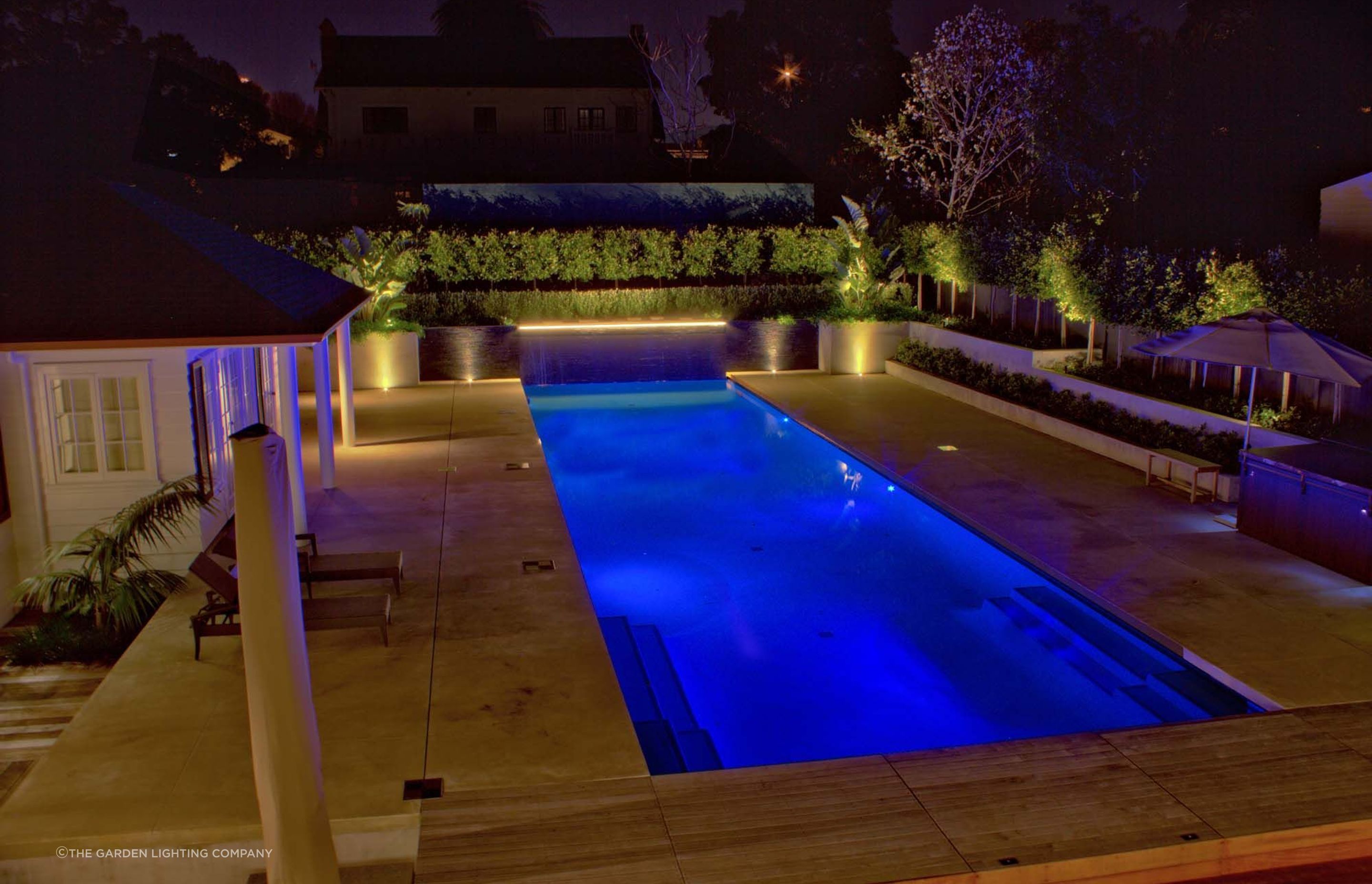Coloured lighting can make a pool glow with stylish energy.