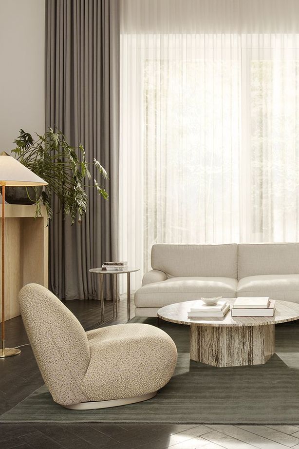 Round coffee tables soften a room, breaking the monotony of straight lines.