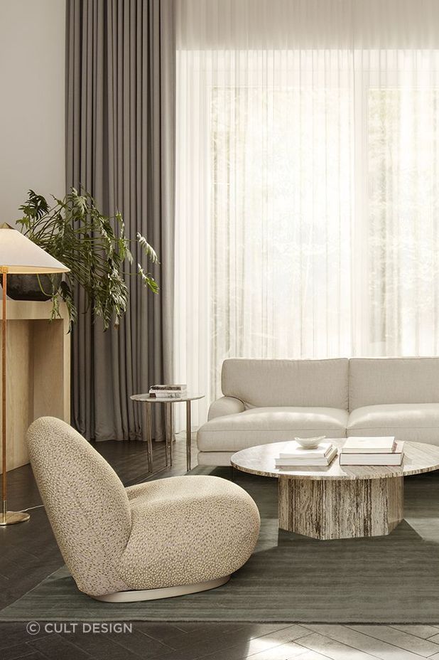 Round coffee tables soften a room, breaking the monotony of straight lines.