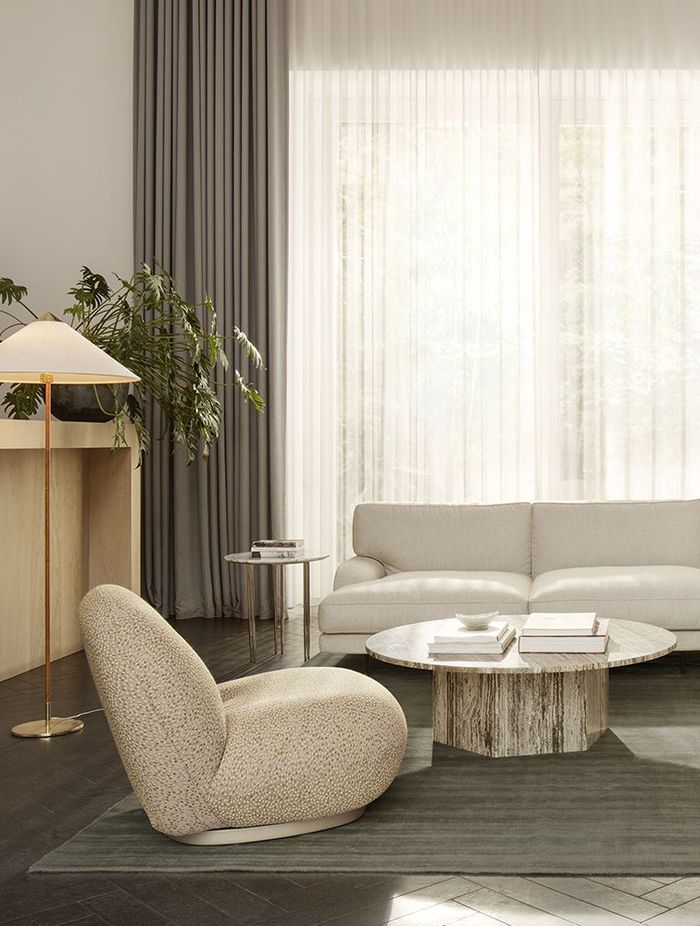 Round coffee tables soften a room, breaking the monotony of straight lines.